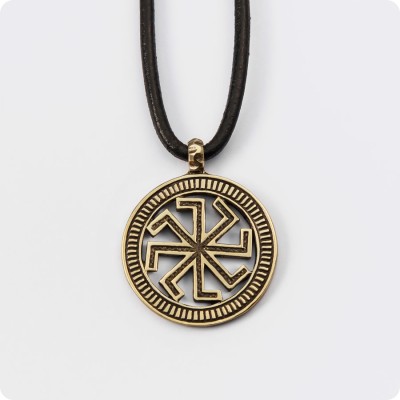 Оберег Колядник из латуни в круге